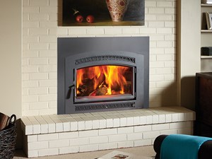 A Lopi Large Flush Wood Hybrid-Fyre™ Arched Fireplace Insert features Modern clean burning technology. Available at The Energy House in Northern California.